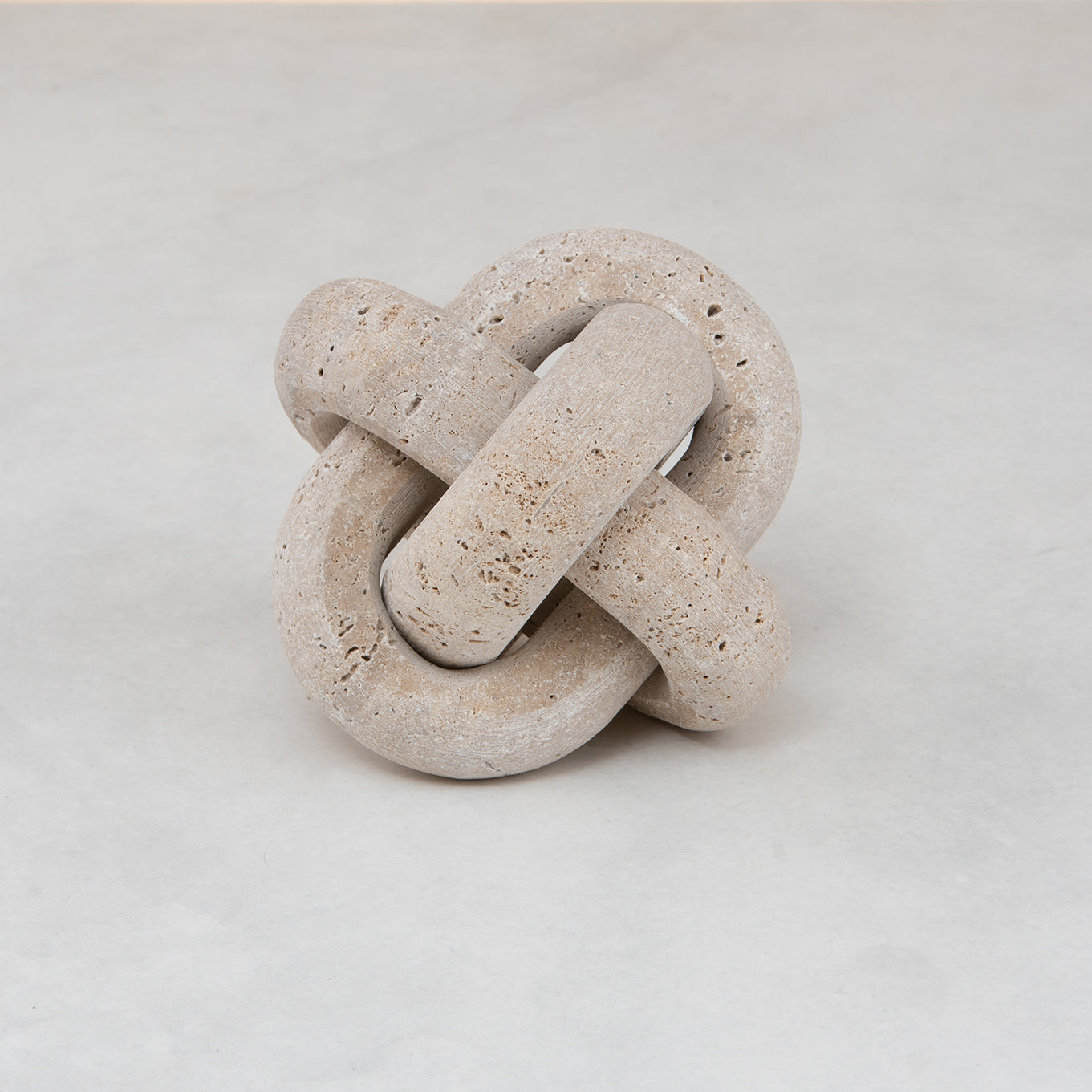 Braided chain travertine