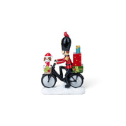 Soldier on Bicycle with Dog & Gifts Figurine - Urban Home